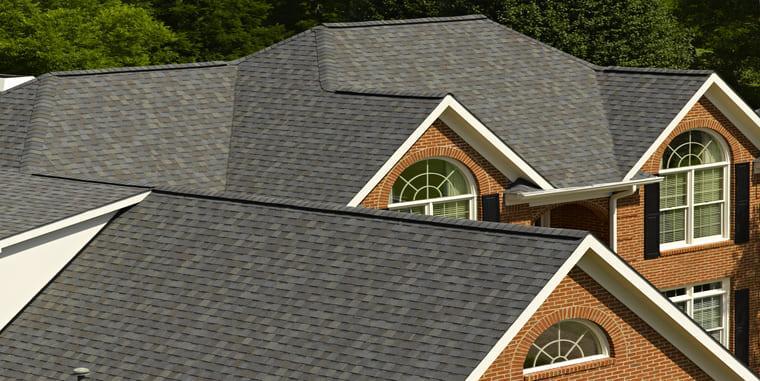 2-story house with shingle roofing system
